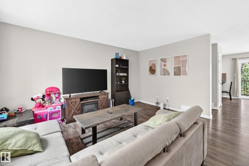#21 8716 179 Av Nw, Edmonton, AB - Indoor Photo Showing Living Room