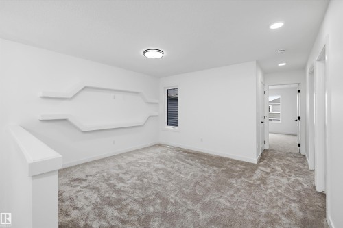 Empty room - 915 Elderberry Landing Nw, Edmonton, AB - Indoor Photo Showing Other Room