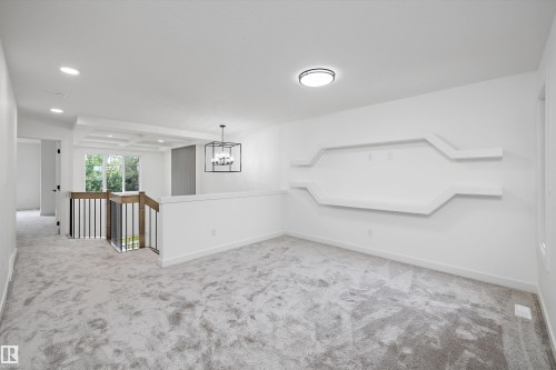 Empty room - 915 Elderberry Landing Nw, Edmonton, AB - Indoor Photo Showing Other Room