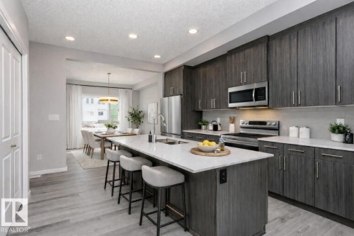 344 Hawthorn Way, Leduc, AB - Indoor Photo Showing Kitchen With Double Sink With Upgraded Kitchen