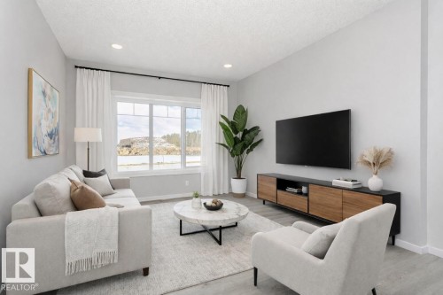 344 Hawthorn Way, Leduc, AB - Indoor Photo Showing Living Room