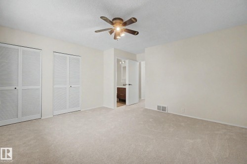 Bright room featuring neutral carpeting and light-toned walls - 170 Westridge Rd, Edmonton, AB - Indoor Photo Showing Other Room