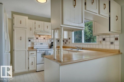 17918 63A Avenue Nw, Edmonton, AB - Indoor Photo Showing Kitchen With Double Sink