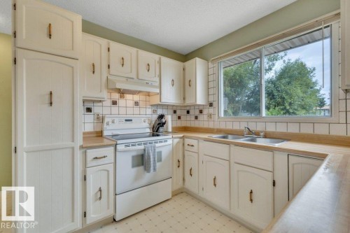 17918 63A Avenue Nw, Edmonton, AB - Indoor Photo Showing Kitchen With Double Sink