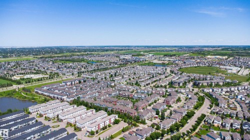 Expansive community showcasing a mix of single-family residences, townhomes, and multi-story buildings - 170 804 Welsh Drive, Edmonton, AB 