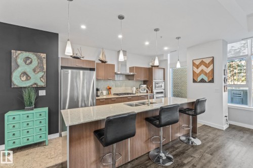 106 2504 109 Street, Edmonton, AB - Indoor Photo Showing Kitchen With Stainless Steel Kitchen With Double Sink With Upgraded Kitchen