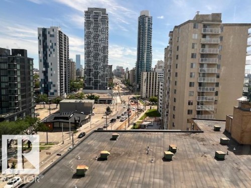 Urban surroundings with various building styles and a multi-lane road - 1101 10011 123 Street, Edmonton, AB 