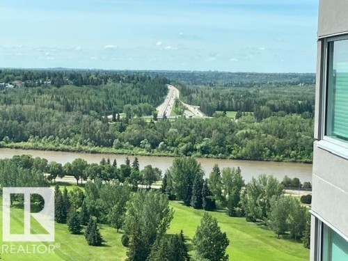 Expansive green space and mature trees bordering a river - 1101 10011 123 Street, Edmonton, AB 