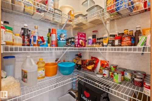 Pantry featuring extensive wire shelving and corner storage - 31 Graywood Cove, Stony Plain, AB 