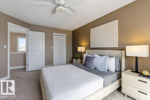 Neutral-toned walls complement plush carpeting - 1119 Potter Greens, Edmonton, AB - Indoor Photo Showing Bedroom