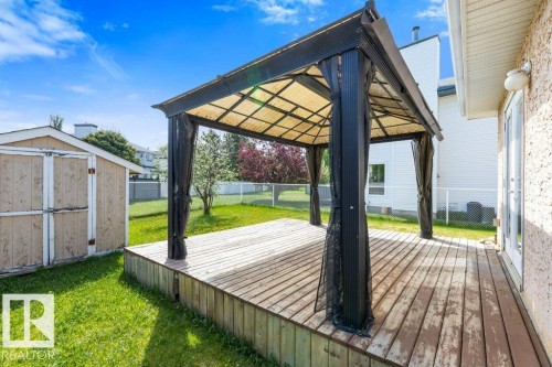 Expansive backyard deck featuring a gazebo with a fabric canopy and privacy screens - 1119 Potter Greens, Edmonton, AB - Outdoor With Deck Patio Veranda With Exterior