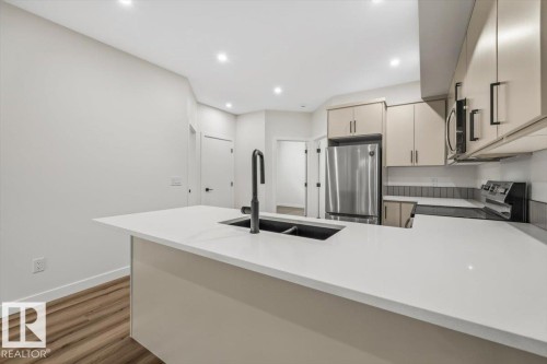 10932 132 Street, Edmonton, AB - Indoor Photo Showing Kitchen With Double Sink With Upgraded Kitchen
