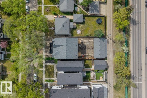 Aerial view of properties featuring multiple structures with dark gray roofing - 10932 132 Street, Edmonton, AB - Outdoor With View