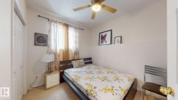 Bedroom featuring neutral wall colors and carpeted flooring - 