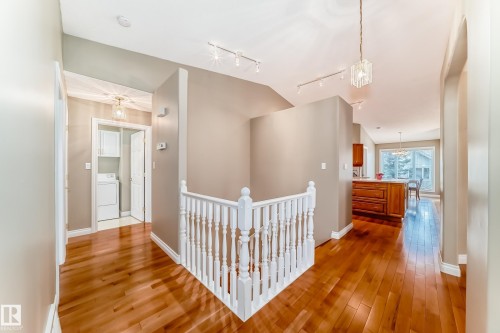 Hardwood flooring throughout the main level - 29 929 Picard Drive, Edmonton, AB - Indoor Photo Showing Other Room