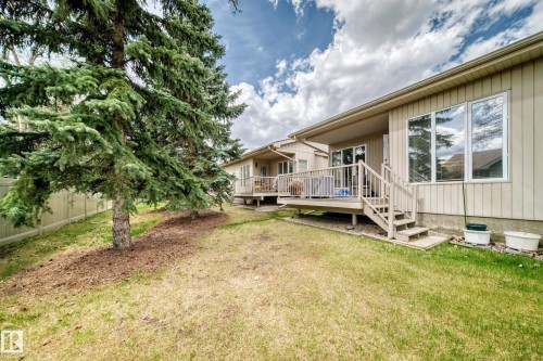 Exterior siding with large windows and a rear deck - 29 929 Picard Drive, Edmonton, AB - Outdoor With Deck Patio Veranda