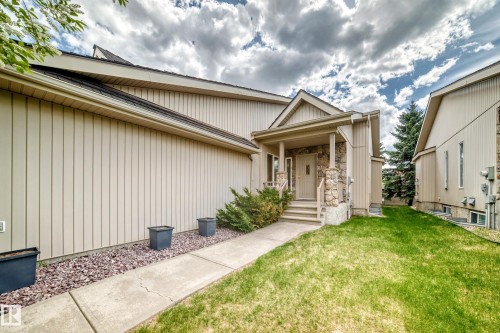 Inviting entrance featuring a stone-clad porch and columns - 29 929 Picard Drive, Edmonton, AB - Outdoor