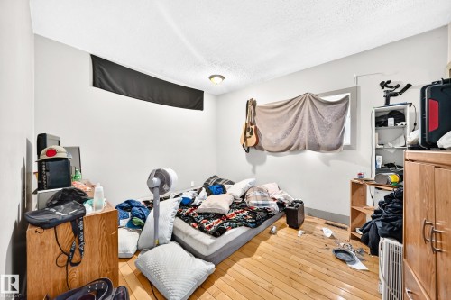 Room with light wood-finish flooring and white painted walls - 199 Westridge Road, Edmonton, AB 
