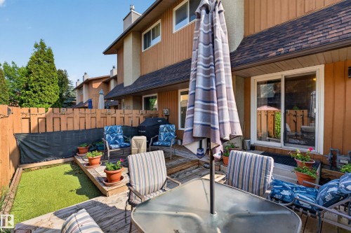 Private backyard deck with multi-level wood decking and a fenced perimeter - 12062 157 Avenue, Edmonton, AB 