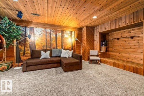Wood-paneled walls and ceiling featuring recessed lighting - 11603 70 Street Nw, Edmonton, AB 