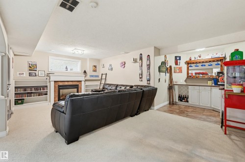927 Hampton Court, Edmonton, AB - Indoor Photo Showing Other Room With Fireplace