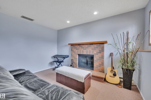 3806 33 Avenue, Leduc, AB - Indoor With Fireplace