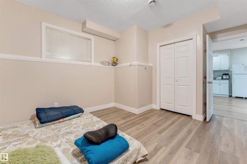 Neutral tone wall paint with crisp white trim throughout - 7920 7 Avenue, Edmonton, AB 