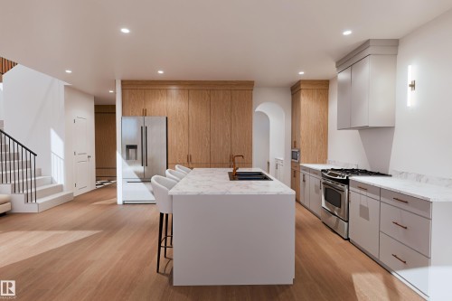 Wood-finish flooring, recessed lighting, and a stainless steel refrigerator - 9134 104 Street, Morinville, AB 