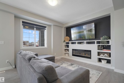 2082 Wonnacott Way, Edmonton, AB - Indoor Photo Showing Living Room With Fireplace