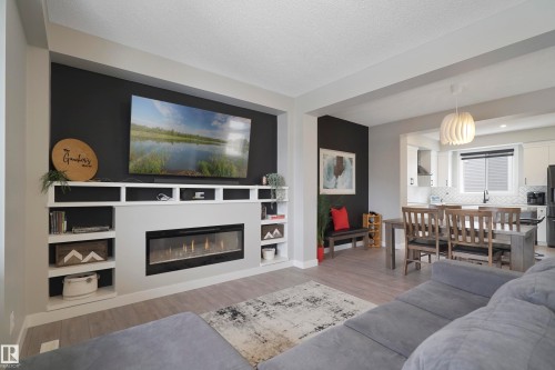 2082 Wonnacott Way, Edmonton, AB - Indoor Photo Showing Living Room With Fireplace