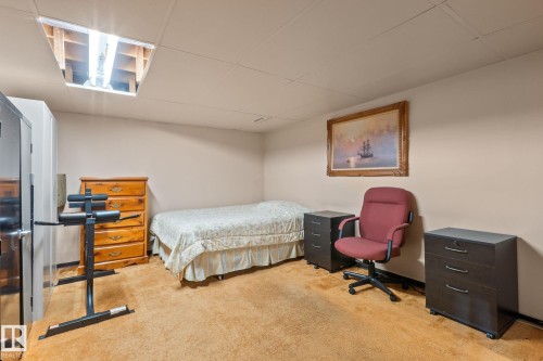 Room featuring light-colored walls and a drop ceiling with recessed lighting - 18126 98 Avenue, Edmonton, AB 