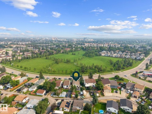 Expansive aerial perspective showcasing a residential area with a large green space - 18126 98 Avenue, Edmonton, AB 
