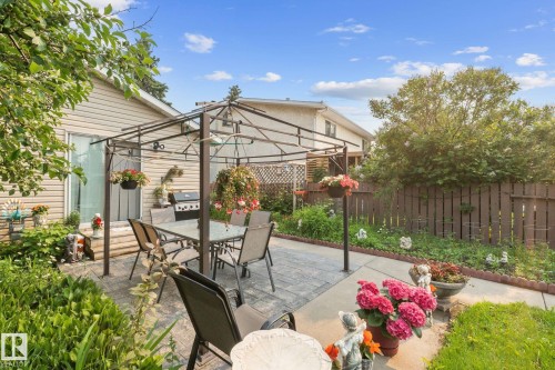 Paved patio area featuring a metal gazebo structure - 18126 98 Avenue, Edmonton, AB 