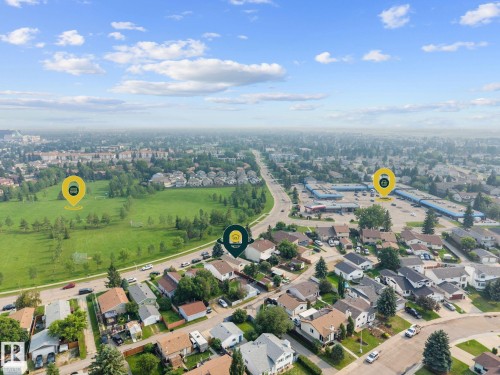 Aerial perspective showcasing a residential neighborhood with a prominent green space - 18126 98 Avenue, Edmonton, AB 