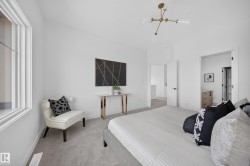 Spacious room featuring neutral carpeting and white wall finishes - 