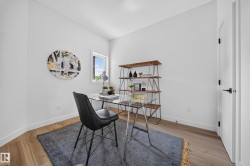 Bright interior space with light wood-finish flooring - 