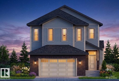 Two-story property featuring light blue horizontal siding and dark brick accents - 9138 104 Street, Morinville, AB 