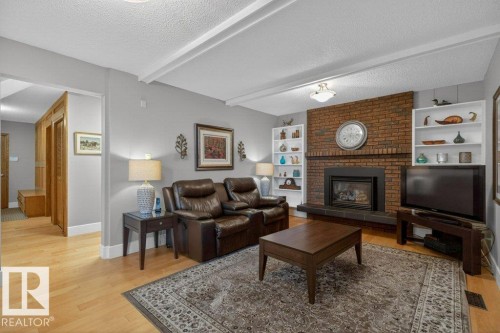 18312 67 Avenue, Edmonton, AB - Indoor Photo Showing Living Room With Fireplace