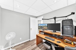 Neutral gray wall paint and wood-finish flooring - 