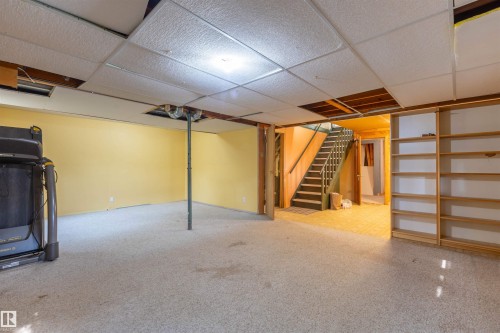Lower level featuring carpeted flooring and drop ceiling - 59228 Rg Rd 11, Rural Westlock County, AB 