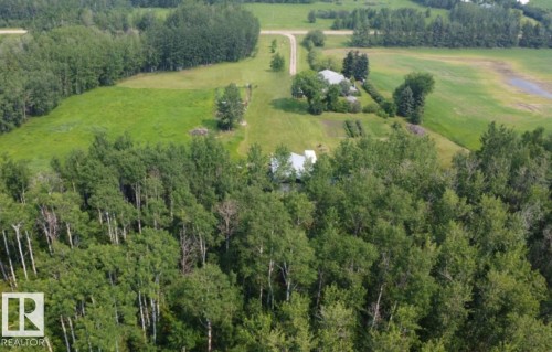 Expansive rural property featuring multiple structures and diverse vegetation - 59228 Rg Rd 11, Rural Westlock County, AB 