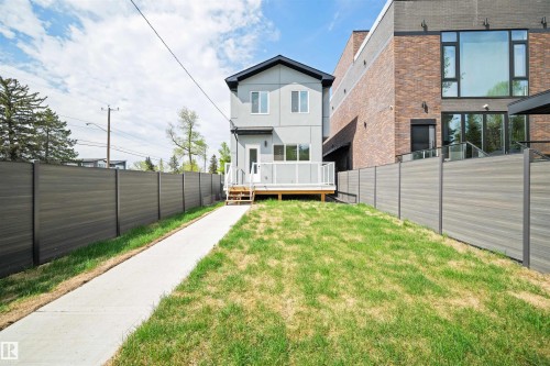 Modern two-story residence featuring a light gray exterior and white trim - 14037 104 Avenue, Edmonton, AB - Outdoor