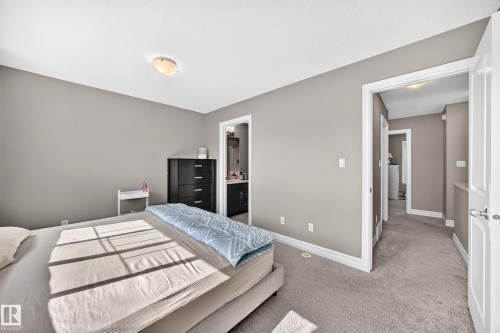 Bedroom featuring neutral tone walls, recessed lighting, and carpet flooring - 10-415 Clareview Rd Nw Nw, Edmonton, AB 