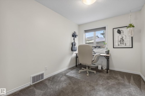 Carpeted room with a single window, white walls, and white trim - 2696 Anderson Crescent, Edmonton, AB - Indoor Photo Showing Other Room