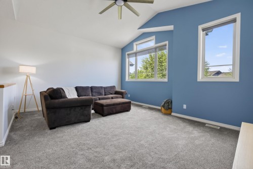 Expansive room with vaulted ceilings and wall-to-wall carpeting - 2696 Anderson Crescent, Edmonton, AB - Indoor