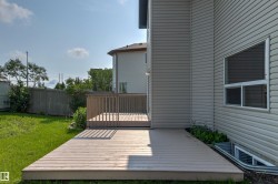 Expansive wood deck with railing and direct access to the interior - 