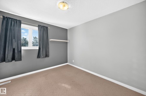 261 Callingwood Two Nw, Edmonton, AB - Indoor Photo Showing Other Room