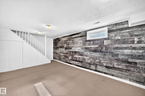 261 Callingwood Two Nw, Edmonton, AB - Indoor Photo Showing Other Room