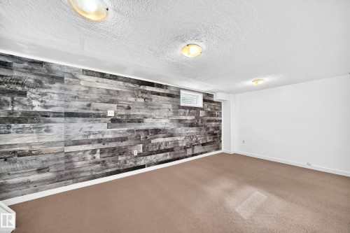 261 Callingwood Two Nw, Edmonton, AB - Indoor Photo Showing Other Room