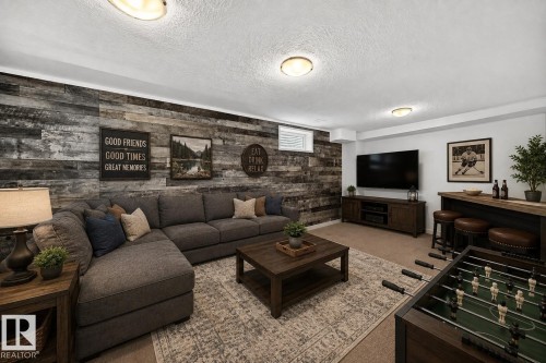 261 Callingwood Two Nw, Edmonton, AB - Indoor Photo Showing Living Room